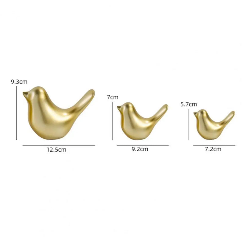 Passarinhos de decoração dourados